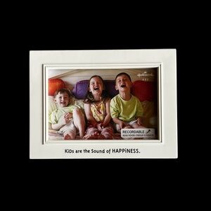 Hallmark 4X6 White Photo Frame with “Kids are the Sound of Happiness”caption.
